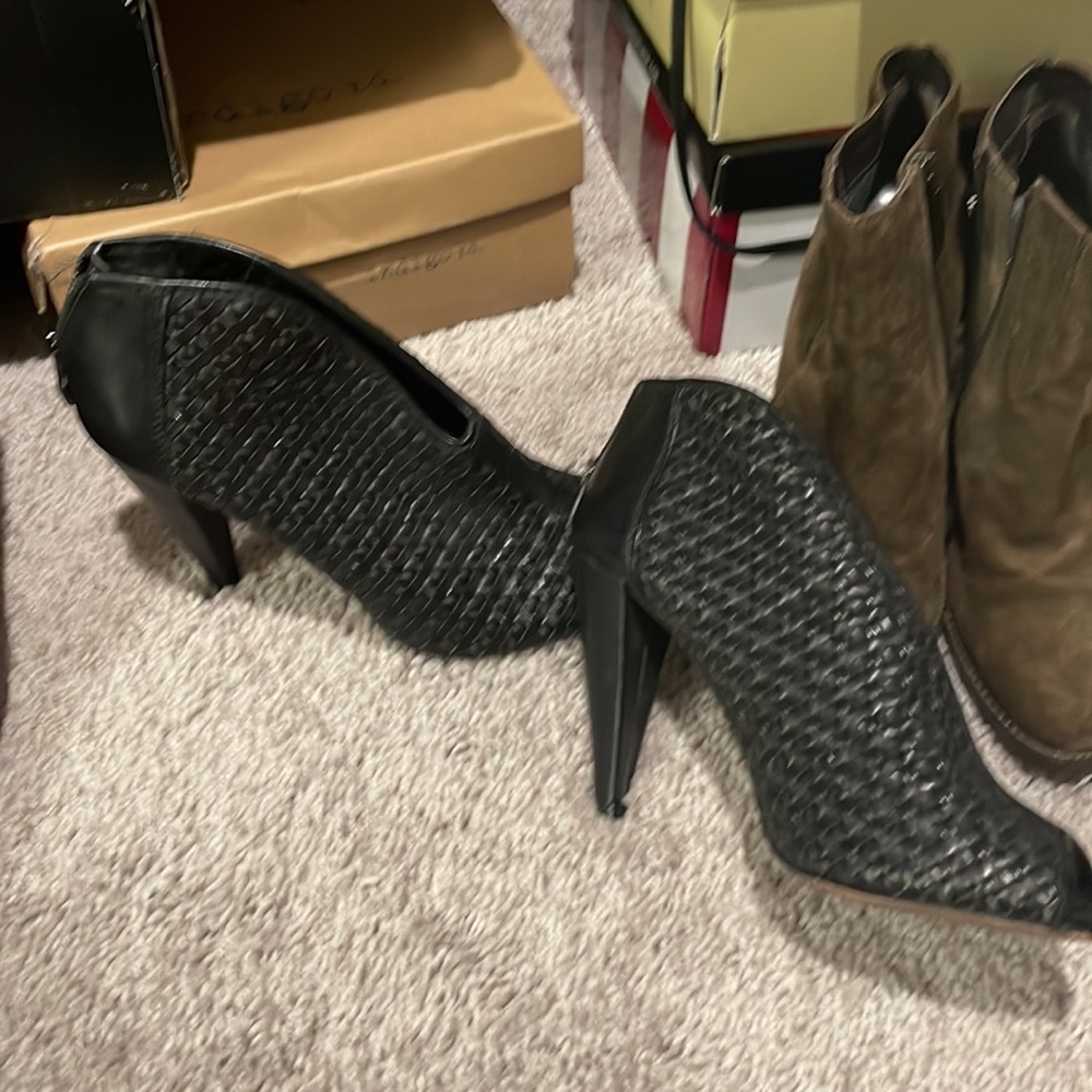 Black cute little booties with high heel. Size 9 1/2